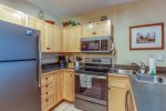Kitchen features stainless steel appliances